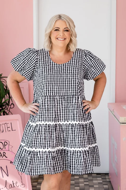 Mini dresses with pocket details for added functionalityGreta Party Dress in Gingham Black