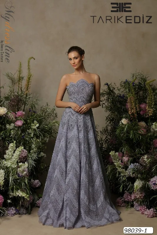 Prom dresses with metallic - colored fabrics and beaded embroidery for a glamorous promTarik Ediz 98039